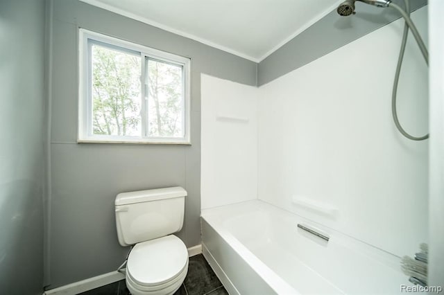 bathroom featuring tile patterned floors and toilet