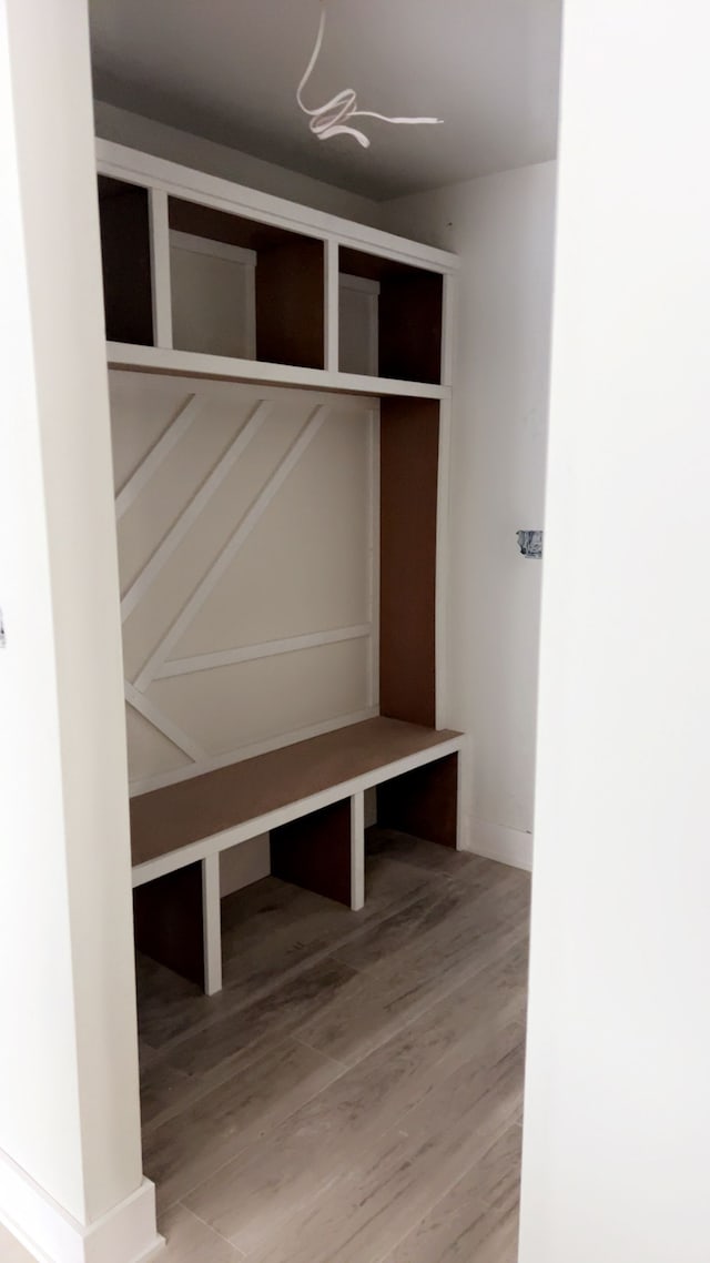 mudroom with hardwood / wood-style flooring