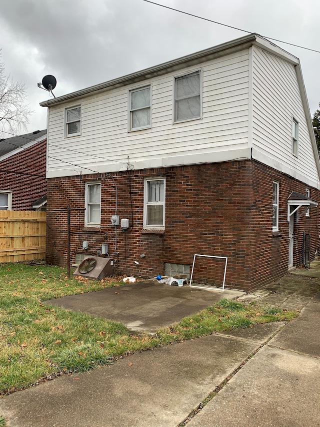 rear view of house with a patio