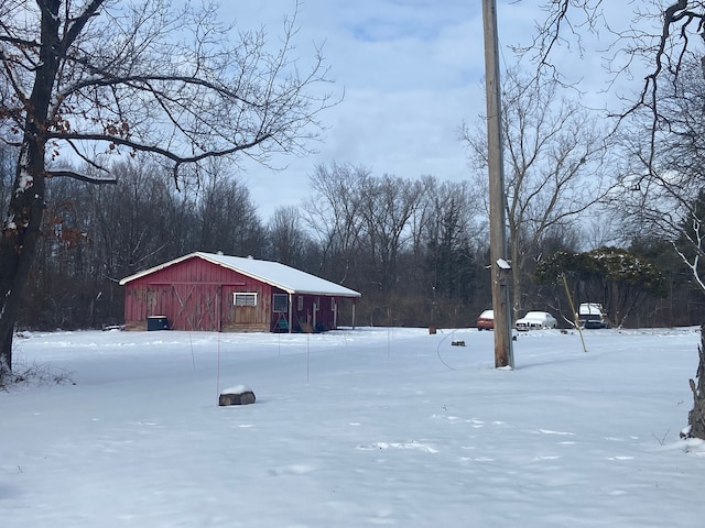 view of yard covered in snow