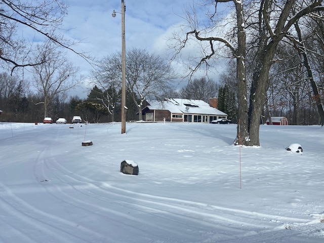 view of snowy yard