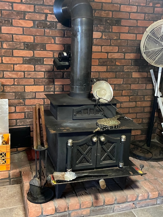 interior details featuring a wood stove