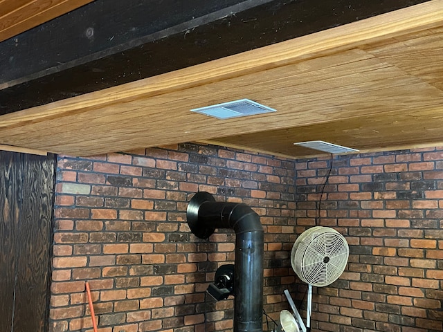 8899 Dwyer Rd, Howell, MI 48855 - detailed view of wood ceiling and brick wall