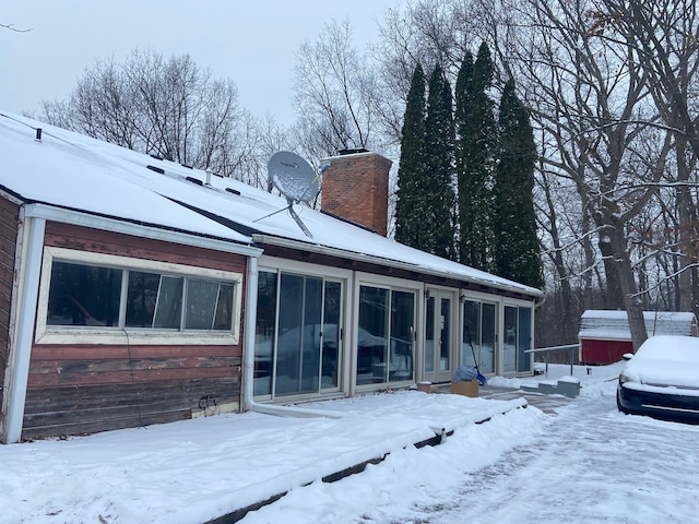 view of snow covered property