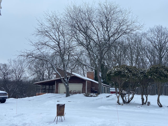 view of snow covered property