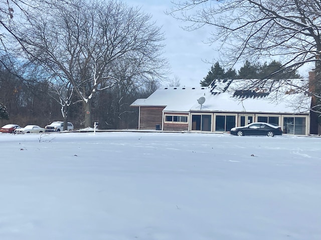 view of yard covered in snow