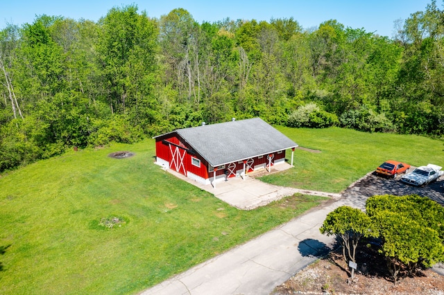 8899 Dwyer Rd, Howell, MI 48855 - drone / aerial view of a heavily wooded area