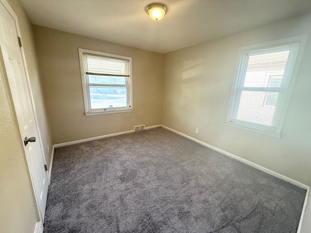 view of carpeted spare room