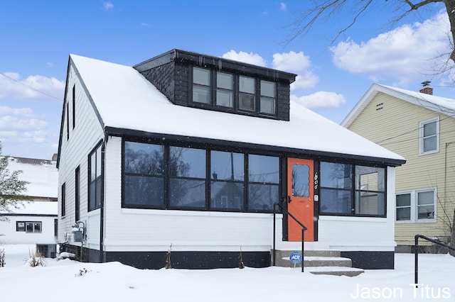 view of front of property with central AC unit