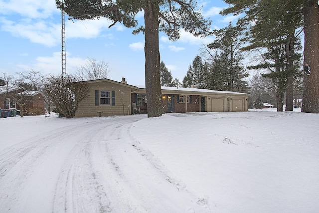 ranch-style home with a garage