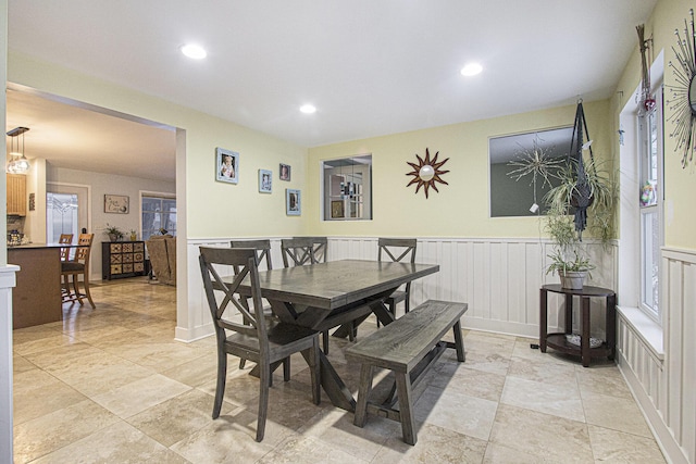 dining area with plenty of natural light