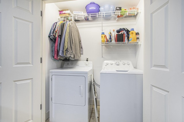 laundry area with washer and clothes dryer