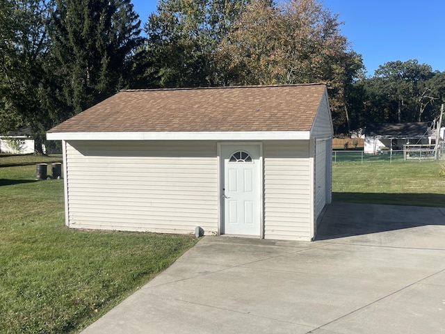 garage with a lawn