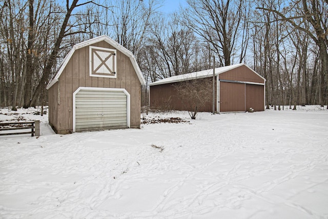 view of snow covered garage