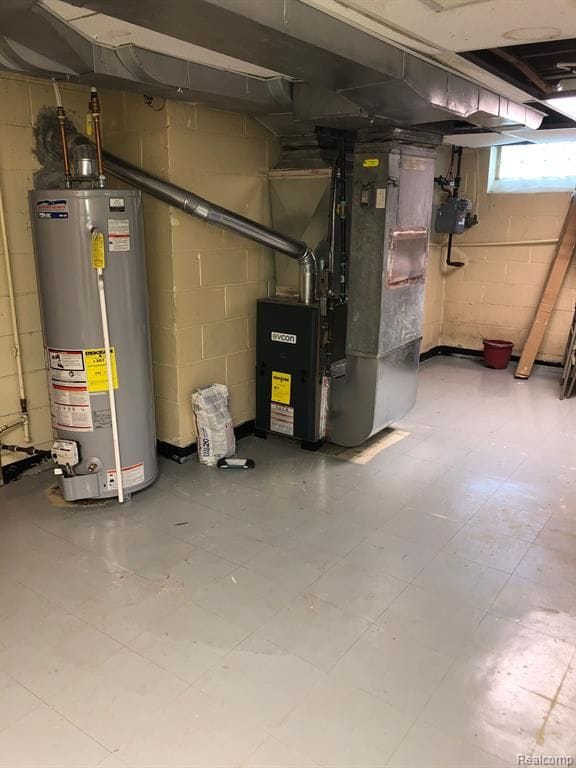 basement featuring water heater