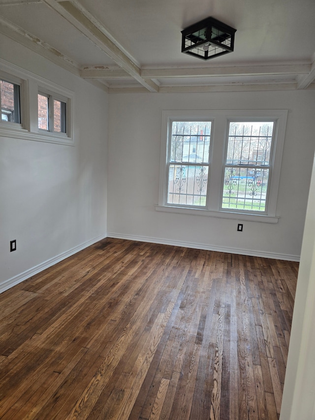 spare room with dark hardwood / wood-style flooring