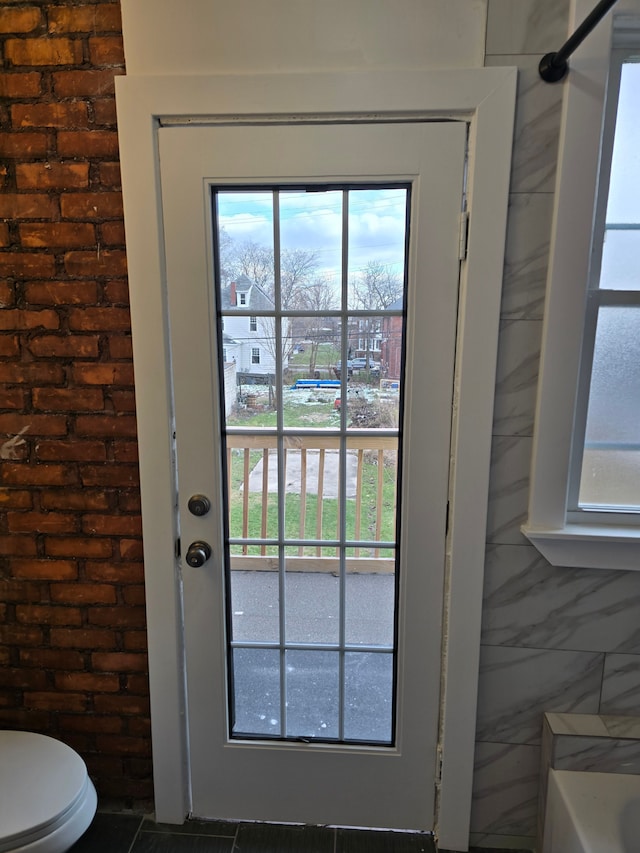 doorway featuring plenty of natural light