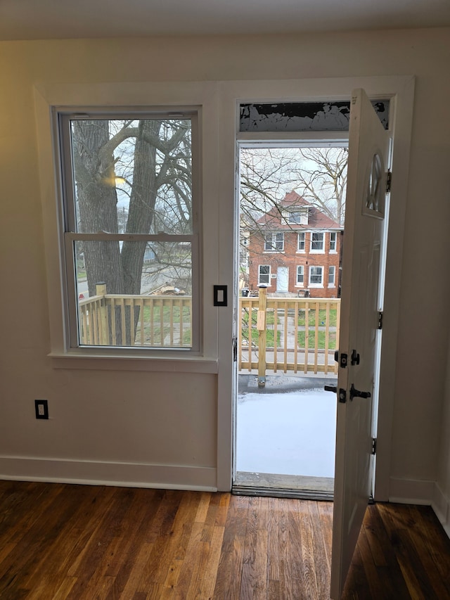 doorway featuring dark hardwood / wood-style flooring