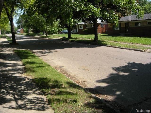 view of community featuring a lawn