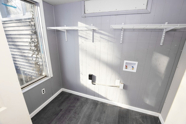 laundry area with dark wood-type flooring and washer hookup