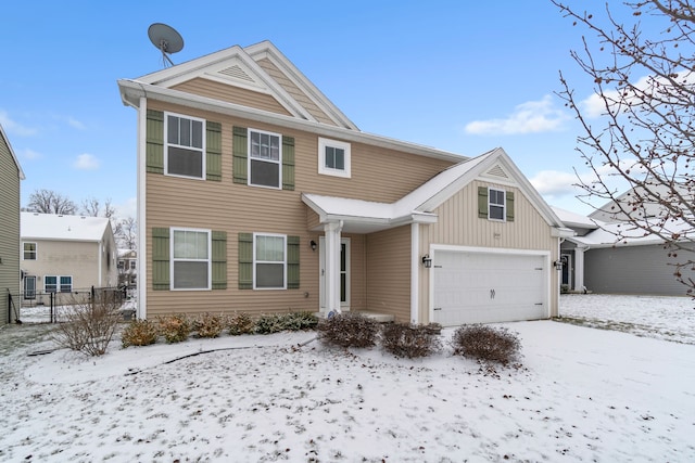 view of front of property with a garage