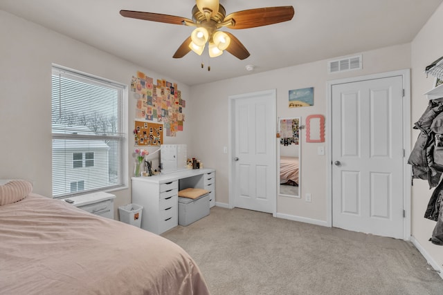 carpeted bedroom featuring ceiling fan