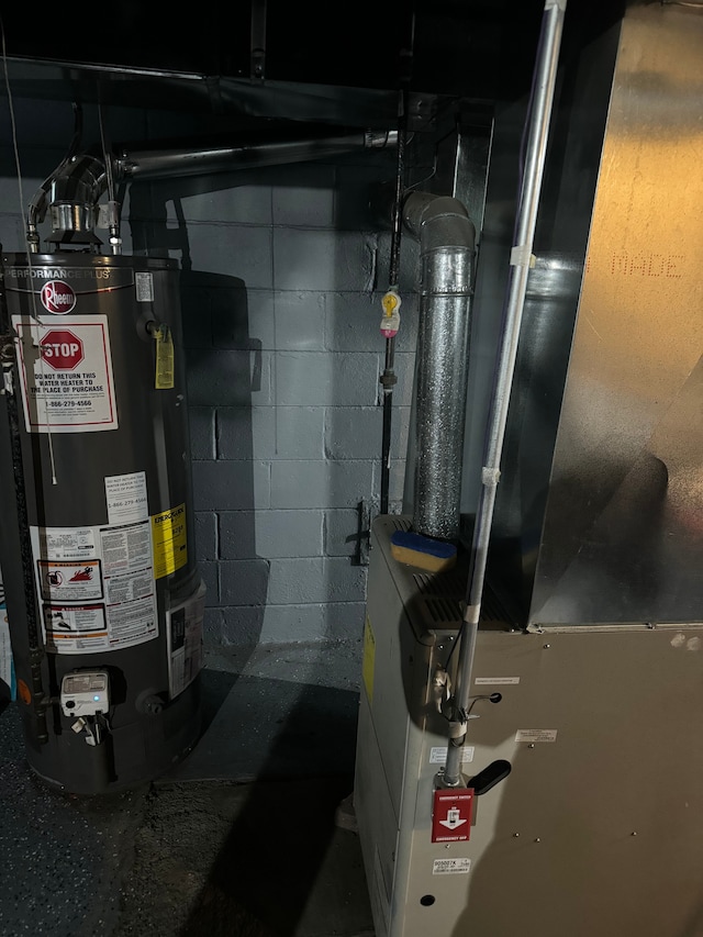 utility room with water heater