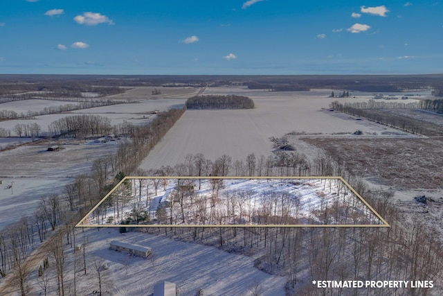 snowy aerial view with a rural view