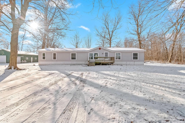 view of front of property featuring a wooden deck