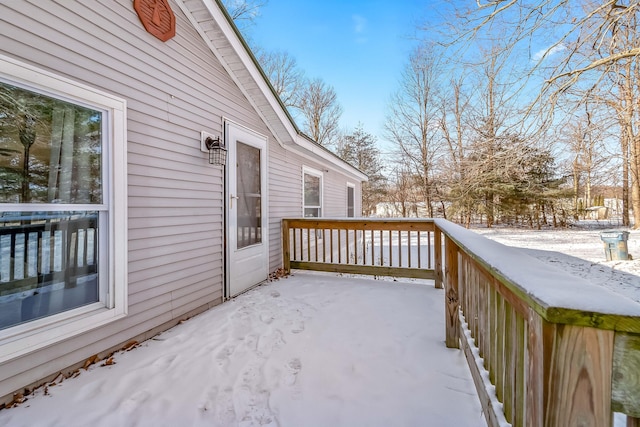 view of snow covered deck