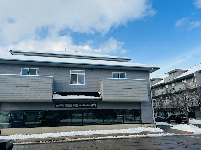 view of snow covered property