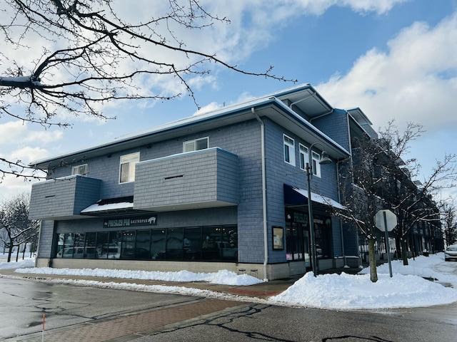 view of snow covered building