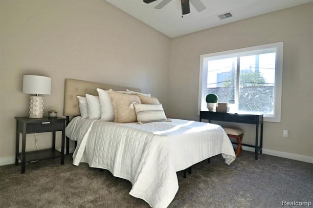 bedroom featuring dark colored carpet and ceiling fan