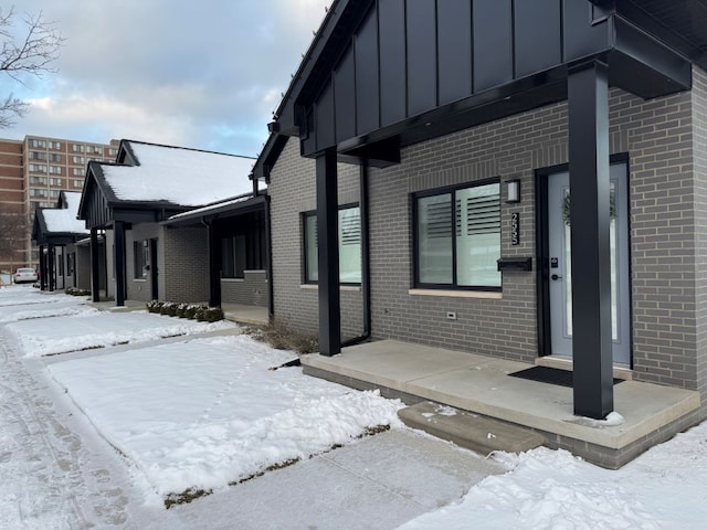 view of snow covered property