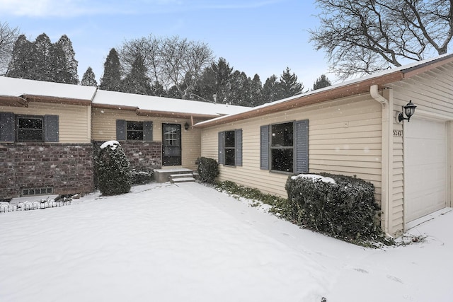 exterior space featuring a garage