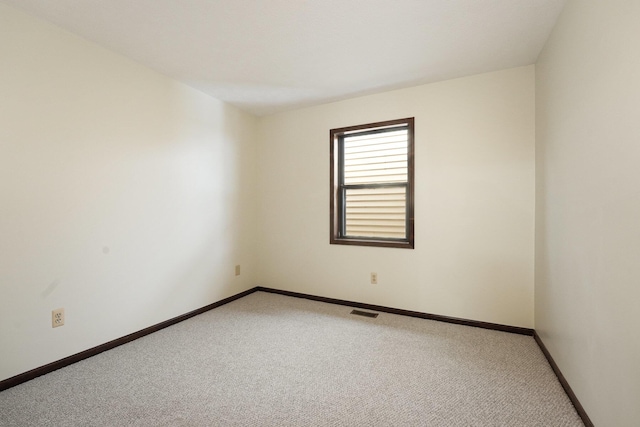 empty room featuring carpet floors