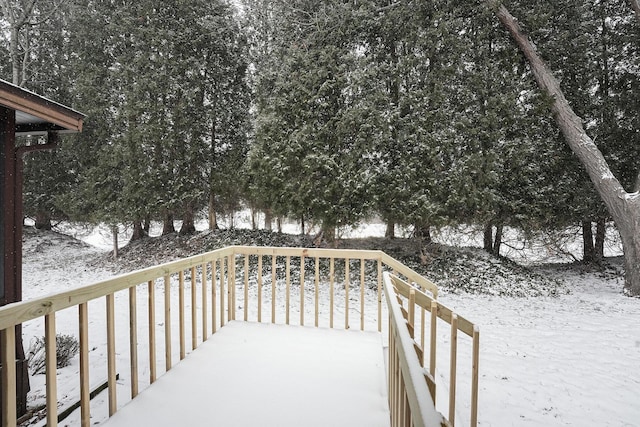 view of snow covered deck