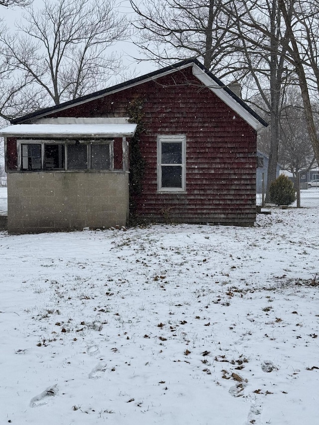 view of snow covered property