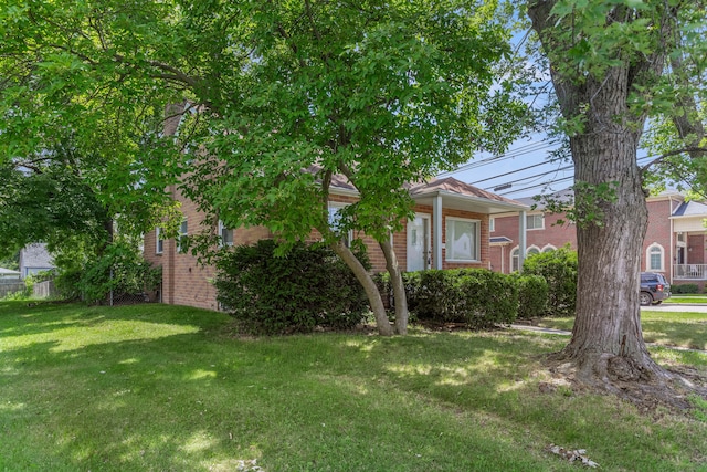 view of front of home with a front yard