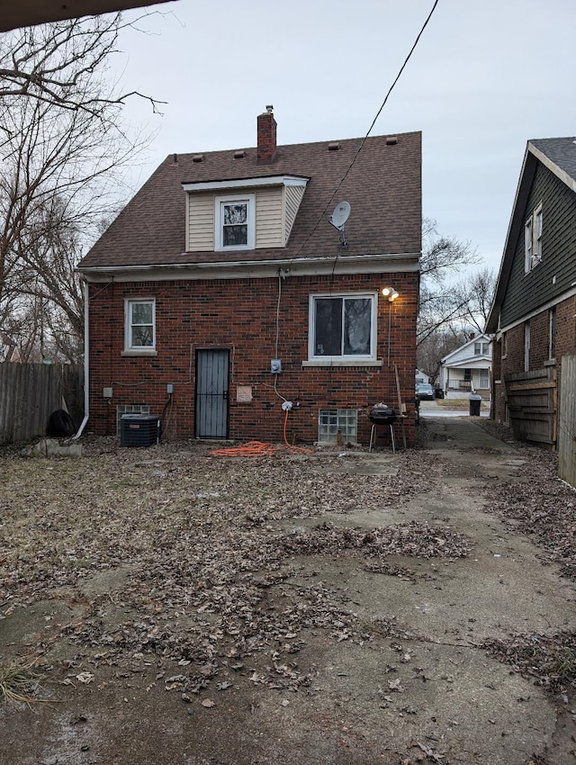 back of house with cooling unit