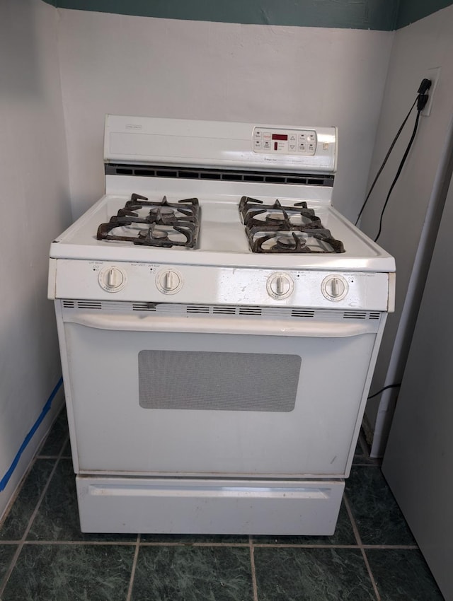 interior details with white range with gas cooktop