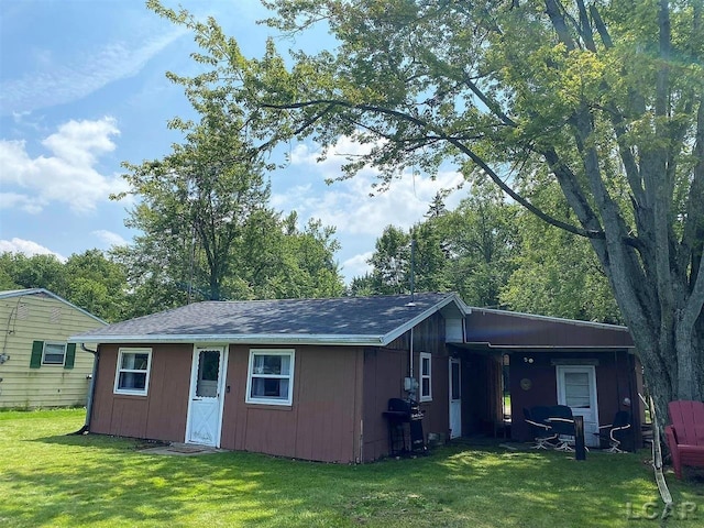 view of outdoor structure with a lawn