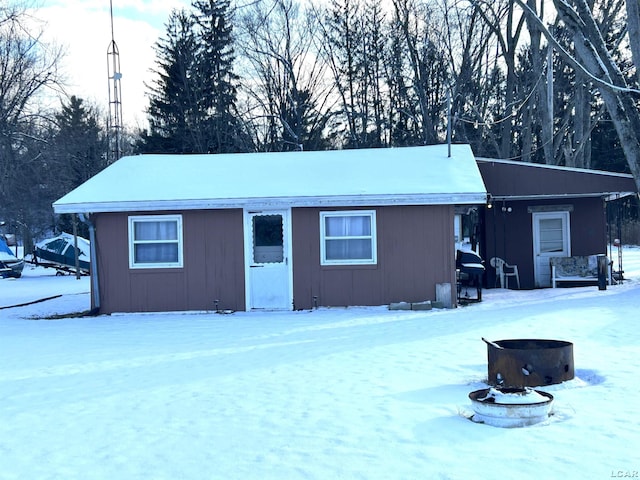 view of snow covered house