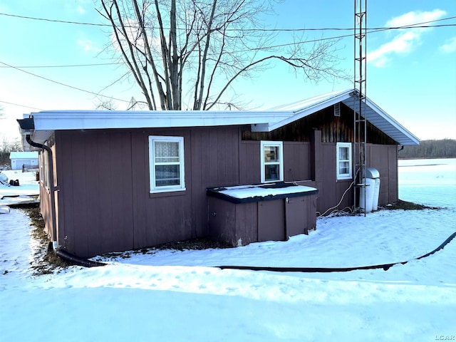 view of snow covered property