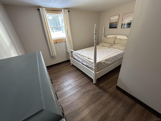 bedroom featuring dark wood-type flooring