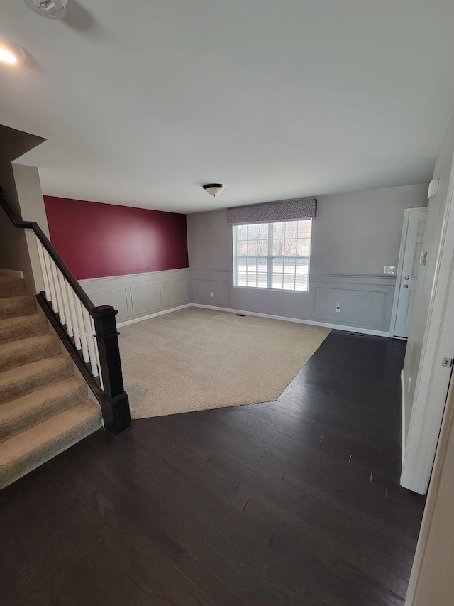 interior space with dark hardwood / wood-style flooring