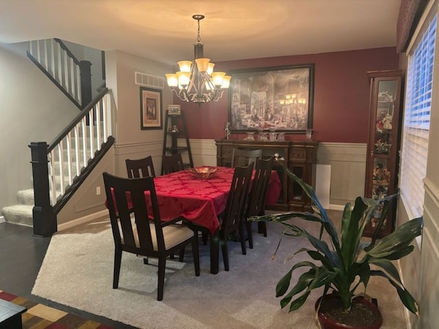 dining room with a chandelier