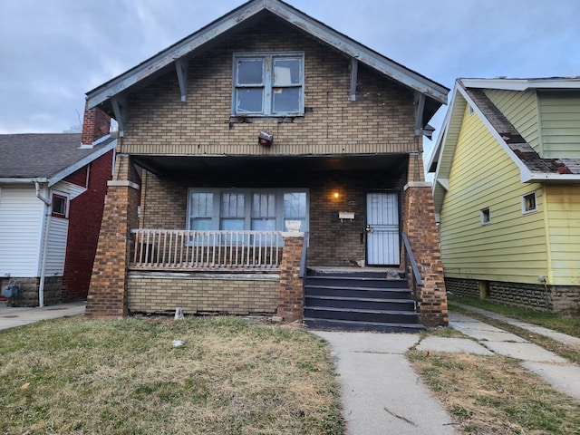 view of front of home featuring covered porch