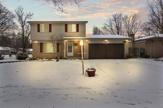 view of front of property featuring a garage