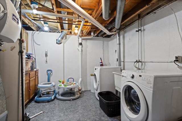 laundry room with separate washer and dryer